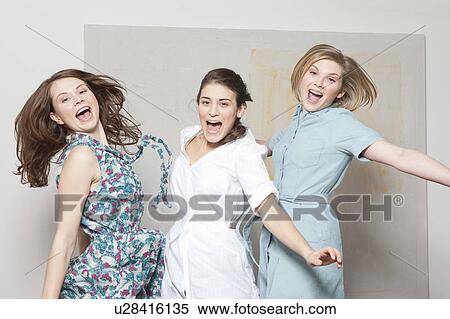 Three women jumping and jubilating View Large Photo Image Stock Photography - Three women jumping and jubilating. Fotosearch