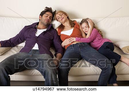 tired family asleep View Large Photo Image Stock Photo - tired family asleep. Fotosearch