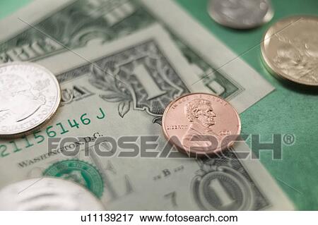 US currency and coins View Large Photo Image Stock Photo - US currency and coins. Fotosearch