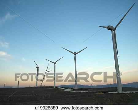 Stock Photo - Wind turbines under construction. Fotosearch