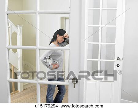 Woman against a wall View Large Photo Image Picture - Woman against a wall. Fotosearch