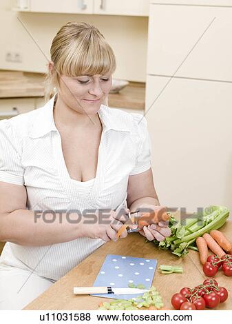 woman cutting vegetables View Large Photo Image Stock Photo - woman cutting vegetables. Fotosearch
