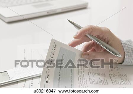 Woman doing financial tax planning View Large Photo Image Stock Photo - Woman doing financial tax planning. Fotosearch