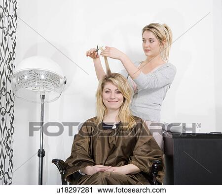 Woman having haircut View Large Photo Image Stock Image - Woman having haircut. Fotosearch