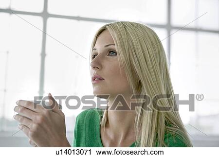 Woman holding a cup. View Large Photo Image Stock Image - Woman holding a cup.. Fotosearch