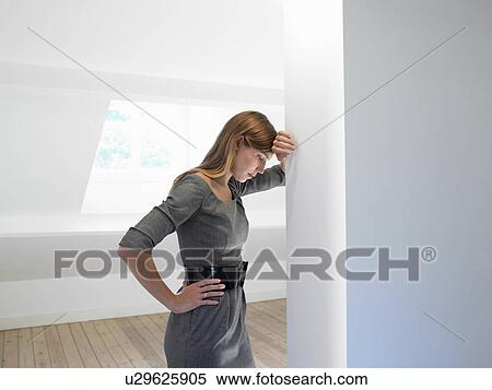 Woman in an empty room View Large Photo Image Stock Photography - Woman in an empty room. Fotosearch