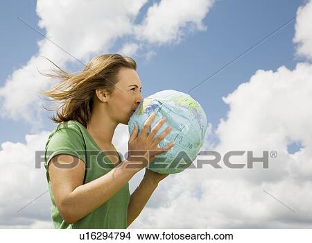 Woman Inflating Globe View Large Photo Image Picture - Woman Inflating Globe. Fotosearch