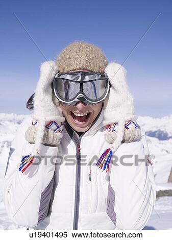Stock Photography - woman laughing at viewer. Fotosearch
