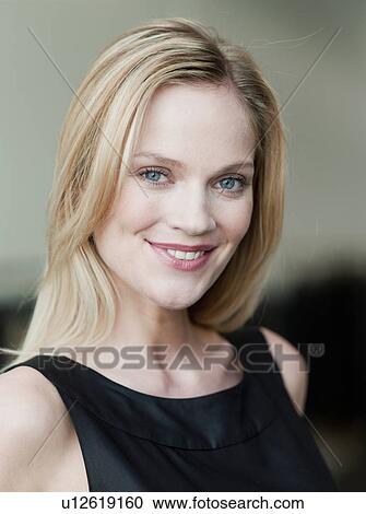 Stock Image - woman looking at viewer. Fotosearch