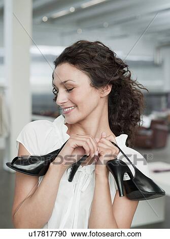 woman shopping for shoes View Large Photo Image Stock Image - woman shopping for shoes. Fotosearch