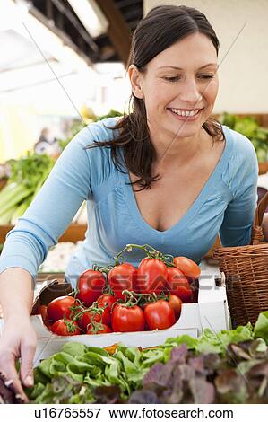 Woman Shopping fresh Vegetables View Large Photo Image Stock Photo - Woman Shopping fresh Vegetables. Fotosearch