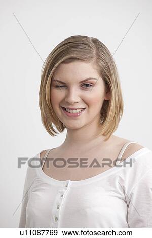 Woman winking View Large Photo Image Stock Photo - Woman winking. Fotosearch