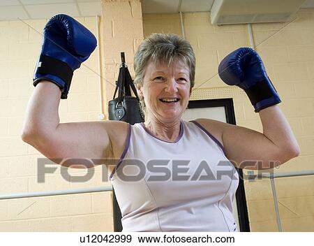 woman winning at boxing exercise at gym View Large Photo Image Stock Photo - woman winning at boxing exercise at gym. Fotosearch