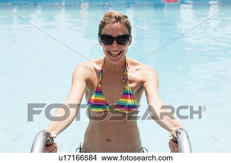 Woman With Sunglasses Climbing Out Pool View Large Photo Image Picture - Woman With Sunglasses Climbing Out Pool. Fotosearch