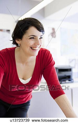 woman working in office View Large Photo Image Stock Photo - woman working in office. Fotosearch