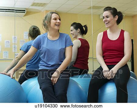 women relaxing at gym View Large Photo Image Stock Image - women relaxing at gym. Fotosearch