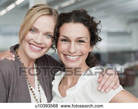 women shopping smiling at viewer View Large Photo Image Stock Photo - women shopping smiling at viewer. Fotosearch