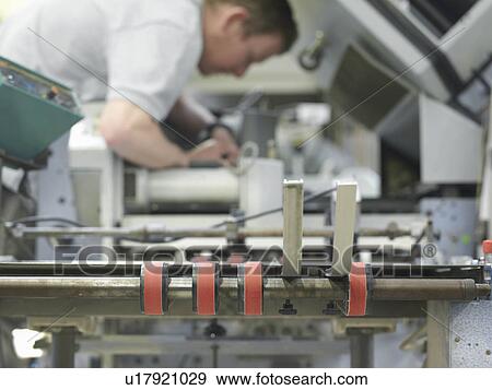 Worker Operating Printer View Large Photo Image Stock Photo - Worker Operating Printer. Fotosearch