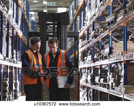 Workers And Forklift In Warehouse View Large Photo Image Stock Image - Workers And Forklift In Warehouse. Fotosearch