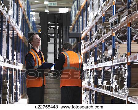 Workers And Forklift In Warehouse View Large Photo Image Stock Photo - Workers And Forklift In Warehouse. Fotosearch