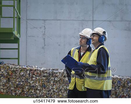 Workers With Bales Of Tin Cans View Large Photo Image Stock Photo - Workers With Bales Of Tin Cans. Fotosearch