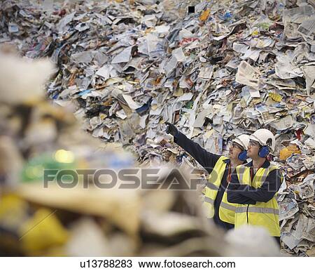 Workers With Paper In Recycle Plant View Large Photo Image Stock Image - Workers With Paper In Recycle Plant. Fotosearch