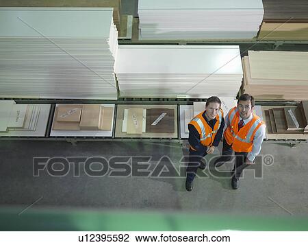 Workers With Product In Warehouse View Large Photo Image Stock Image - Workers With Product In Warehouse. Fotosearch