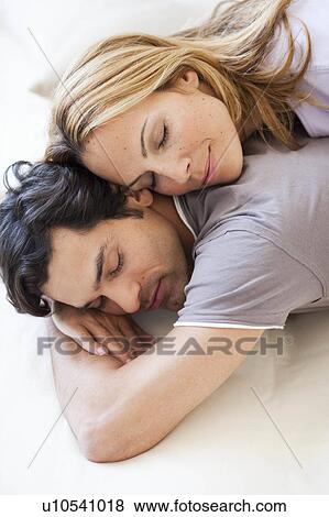 young couple sleeping View Large Photo Image Stock Photo - young couple sleeping. Fotosearch