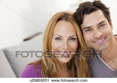 young couple smiling View Large Photo Image Stock Image - young couple smiling. Fotosearch