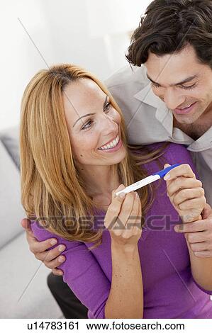 young couple with pregnancy test View Large Photo Image Stock Image - young couple with pregnancy test. Fotosearch