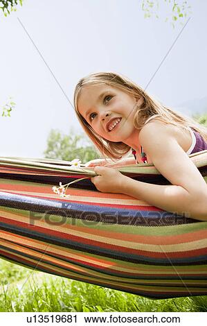 Stock Image - Young Girl In Hammock. Fotosearch