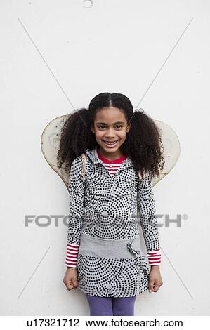 young girl looking at viewer View Large Photo Image Stock Image - young girl looking at viewer. Fotosearch