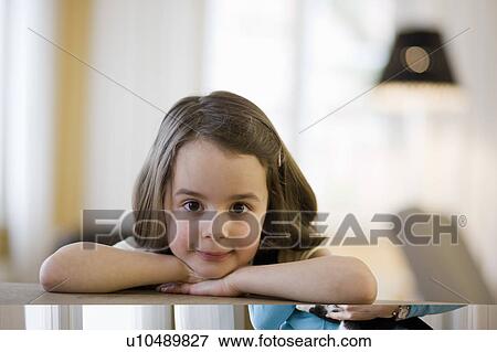 young girl looking at viewer View Large Photo Image Stock Photo - young girl looking at viewer. Fotosearch