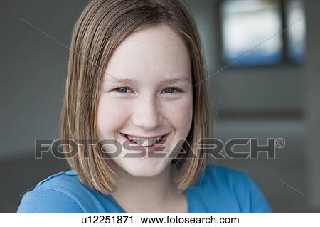 young girl smiling at viewer View Large Photo Image Stock Image - young girl smiling at viewer. Fotosearch
