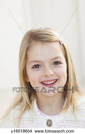 Picture - young girl with blond hair. Fotosearch