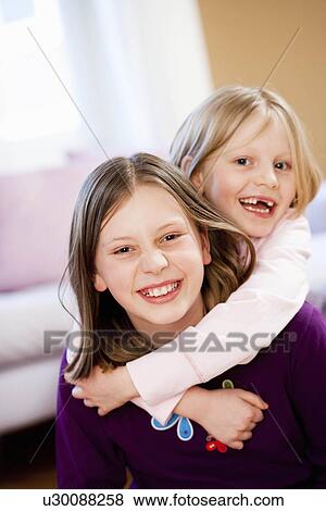 young sisters playing View Large Photo Image Stock Photo - young sisters playing. Fotosearch
