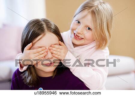 young sisters playing View Large Photo Image Stock Photograph - young sisters playing. Fotosearch