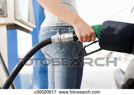 Young Woman at Gas Station View Large Photo Image Stock Photo - Young Woman at Gas Station. Fotosearch