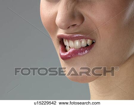 Stock Image - Young woman, close-up. Fotosearch
