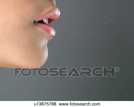Young woman, close-up View Large Photo Image Stock Photo - Young woman, close-up. Fotosearch