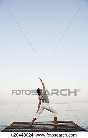 Young Woman Doing Yoga At Jetty View Large Photo Image Picture - Young Woman Doing Yoga At Jetty. Fotosearch