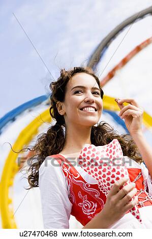 Young Woman Eating Almonds View Large Photo Image Stock Photo - Young Woman Eating Almonds. Fotosearch