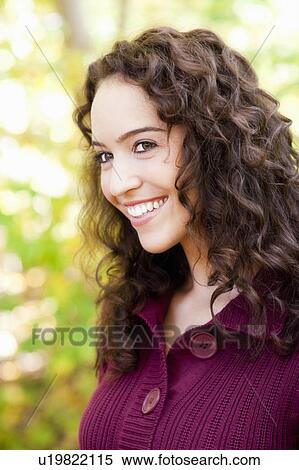 Stock Photography - young woman in nature portrait. Fotosearch