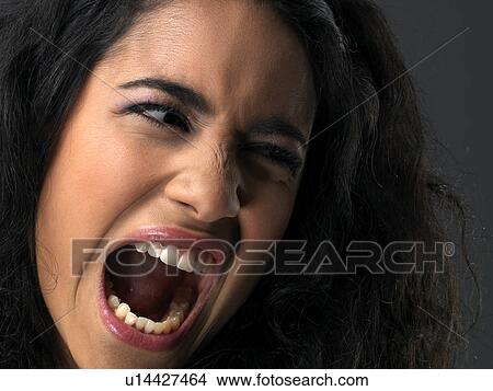 Young woman screaming View Large Photo Image Picture - Young woman screaming. Fotosearch