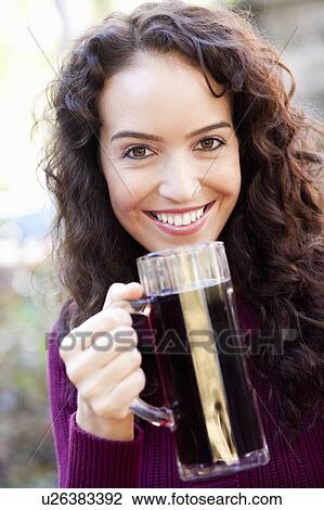 young woman with drink View Large Photo Image Stock Image - young woman with drink. Fotosearch