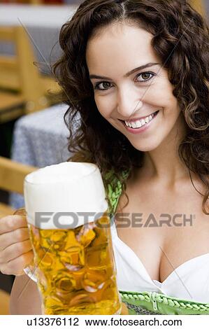 Young Woman With Glass of Beer View Large Photo Image Stock Image - Young Woman With Glass of Beer. Fotosearch