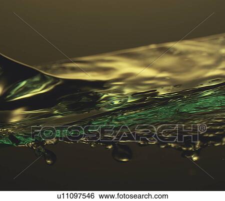 Stock Photograph - Air bubbles in water, close up. Fotosearch