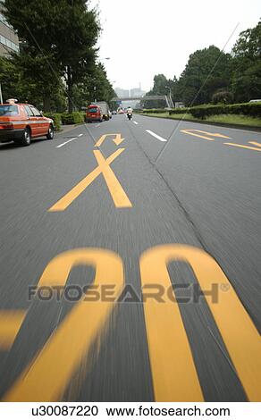 Stock Image - Arrow on road. Fotosearch