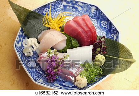 Assorted slices of raw fish on plate View Large Photo Image Stock Image - Assorted slices of raw fish on plate. Fotosearch