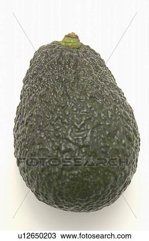 Stock Image - Avocado, close up, white background. Fotosearch
